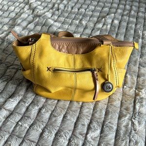 The Sak yellow handbag